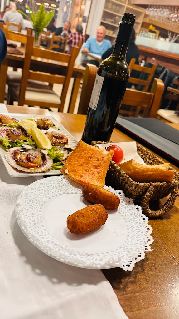 Fresh croquetas and seafood tapas on a beautiful table